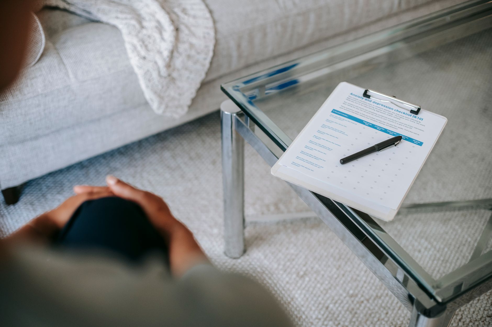 crop woman in office with clipboard